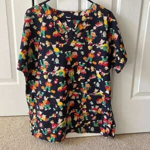 Scrub top with a Fall theme size Medium